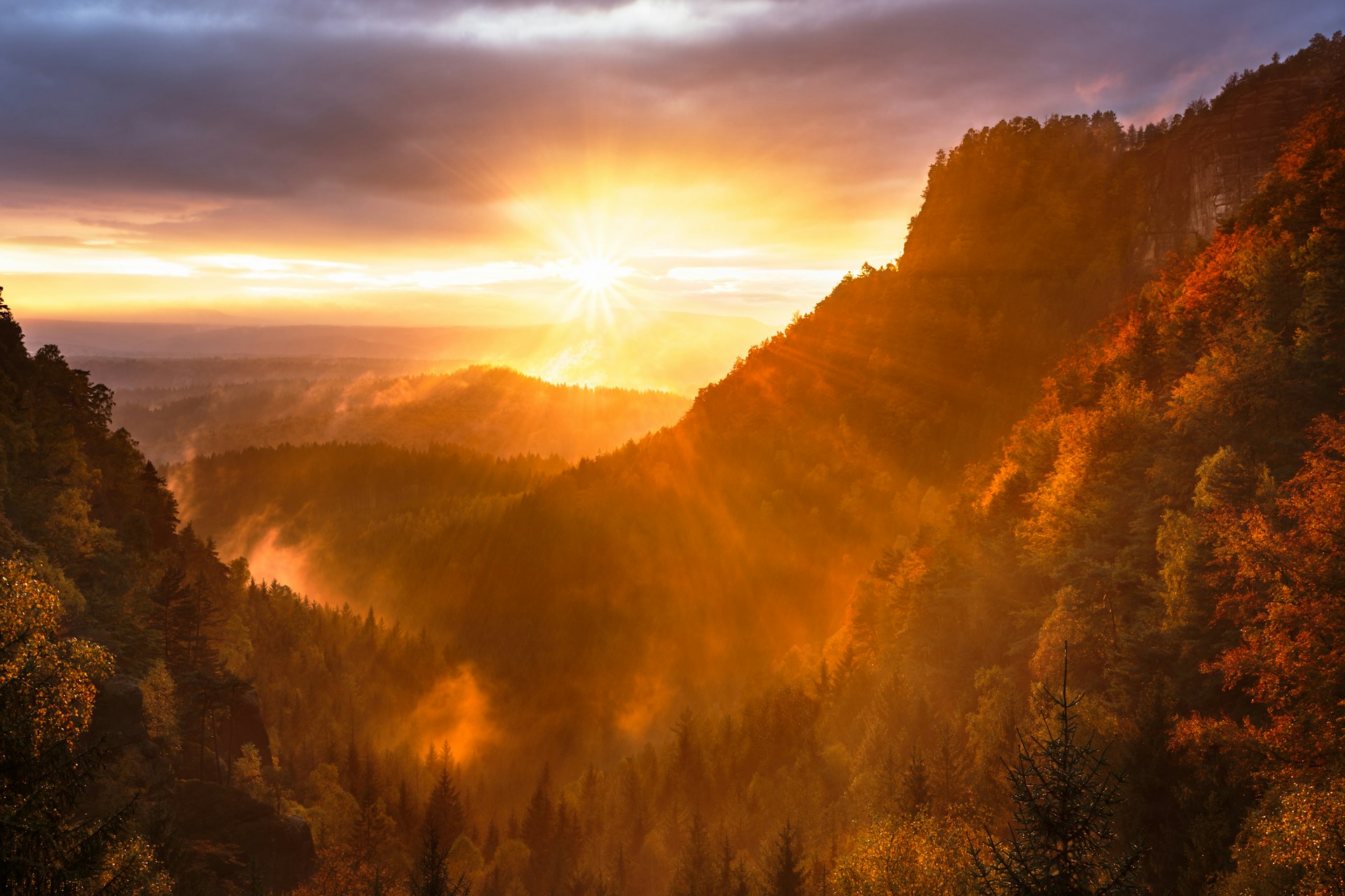 Rising sun over mountains representing Vision